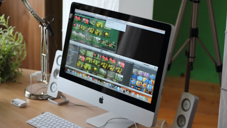 Real editing workstation with timeline on the monitor and headphones, used for editing YouTube videos